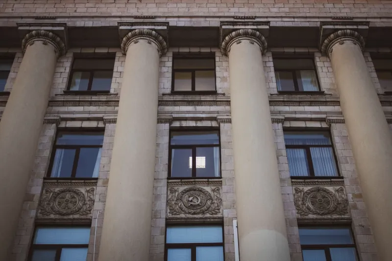 The Machinery Remembers: How Administrators Buried Empires and Kept Working
